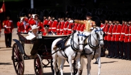 Britain's King Charles III and Britain's Queen Camilla arrive to Horse Guards Parade during the King's Birthday Parade, 