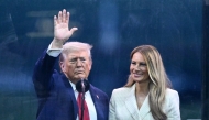US President Donald Trump (L) waves next to US First Lady Melania Trump after the Army 250th Anniversary Parade in Washington, DC on June 14, 2025. Photo by Mandel NGAN / AFP.