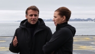 French President Emmanuel Macron (left) and Denmark's Prime Minister Mette Frederiksen aboard the Danish frigate F363 Niels Juel in Nuuk, Greenland, on June 15, 2025. (Photo by Ludovic Marin / AFP)
