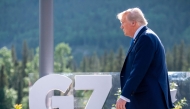 US President Donald Trump arrives for a family photo during the Group of Seven (G7) Summit at the Kananaskis Country Golf Course in Kananaskis, Alberta, Canada on June 16, 2025. (Photo by Michael Kappeler / POOL / AFP)