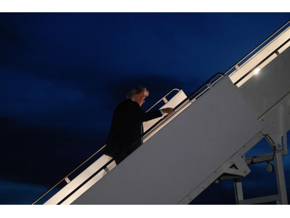 (Files) President Trump boarding the Air Force One