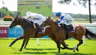 Jockey Jean-Bernard Eyquem and Laffan lead the race.