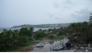 This frame grab from AFPTV video footage shows the popular tourist town of Puerto Escondido as Hurricane Erick approaches Mexico's Pacific coast as a powerful Category 3 storm in Oaxaca state, Mexico on June 18, 2025. Photo by Carlo ECHEGOYEN / AFPTV / AFP