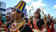Indigenous Bidayuh women take part in a procession during the Gawai Dayak Culture Parade in Kuching, capital of the Malaysian state of Sarawak, on June 21, 2025. (Photo by Mohd RASFAN / AFP)
