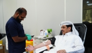 Director of the Public Relations and Communications Department at MECC Farhoud Al-Hajri donating blood during the campaign.