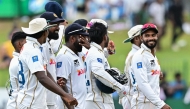 Sri Lanka's players leave the field at the end of play on the third day of the second Test cricket match between Sri Lanka and Bangladesh at the Sinhalese Sports Club (SSC) Ground in Colombo on June 27, 2025. (Photo by Ishara S. KODIKARA / AFP)