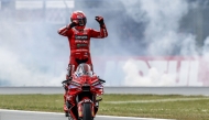 Ducati Lenovo Team's Spanish rider Marc Marquez celebrates after winning the MotoGP race as part of the Dutch Motorcycle Grand Prix at the TT Circuit Assen, in Assen, on June 29, 2025. (Photo by Vincent JANNINK / ANP / AFP)