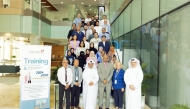 Officials and participants during the workshop.