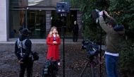 A television journalist prepares to speak in front of cameras as she stands outside the Latrobe Valley Magistrates' Court in Morwell on June 30, 2025. Photo by WILLIAM WEST / AFP