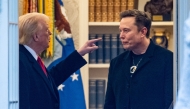 US President Donald Trump and Elon Musk in the Oval Office before departing the White House in Washington, DC, on the way to Trump's residence at Mar-a-Lago in Palm Beach, Florida on March 14, 2025. (Photo by Roberto Schmidt / AFP)