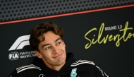Mercedes' British driver George Russell looks on during a press conference ahead of the Formula One British Grand Prix at the Silverstone motor racing circuit in Silverstone, central England, on July 3, 2025. (Photo by Ben STANSALL / AFP)