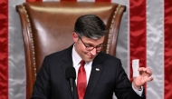 US House Speaker Mike Johnson shows the final tally of the vote on US President Donald Trump's tax bill on the floor of the House of Representatives at the US Capitol in Washington, DC, on July 3, 2025. Photo by Alex WROBLEWSKI / AFP.
