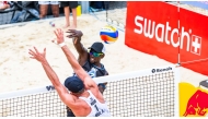 Qatar's Ahmed Tijan shoots to score. 