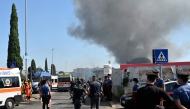 Firemen, policemen and rescue teams work on the site of an explosion in a fuel station in Rome on July 4, 2025. Photo by Andreas SOLARO / AFP