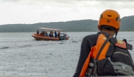 Rescuers search for missing victims of a ferry accident in the waters off the Bali Strait in Jembrana, Bali, on July 4, 2025. Photo by Dicky Bisinglasi / AFP
