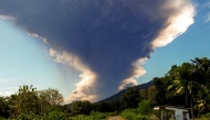 Mount Lewotobi Laki-laki erupts, as seen from Nangahale village in Sikka, East Nusa Tenggara on July 7, 2025. (Photo by ARNOLD WELIANTO / AFP)