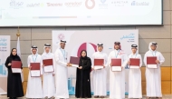 Executive Director of QCDC Saad Abdulla Al-Kharji with participants during the closing ceremony. 