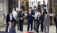 South Korea’s former president Yoon Suk Yeol (centre) leaves the Seoul Central District Court in Seoul on July 9, 2025, before being driven to the Seoul Detention Centre in Uiwang. (AFP)