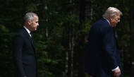 (FILES) Canadian Prime Minister Mark Carney (L) greets US President Donald Trump during an arrival ceremony at the Group of Seven (G7) Summit at the Pomeroy Kananaskis Mountain Lodge in Kananaskis, Alberta, Canada on June 16, 2025. (Photo by Brendan SMIALOWSKI / AFP)
