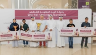 Officials with the winners of the 3rd Qatar Rail Chess Open 2025.