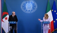 Italy's Prime Minister Giorgia Meloni (R) addresses a joint press conference with Algeria's President Abdelmadjid Tebboune (L) during a summit at the Villa Doria Pamphili in Rome on July 23, 2025. (Photo by Tiziana FABI / AFP)
