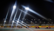 Riders compete during the MotoGP Grand Prix of Qatar at the Lusail International Circuit in this file photo. AFP
