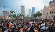 Protesters gather near Merdeka Square during a protest in Kuala Lumpur on July 26, 2025. (Photo by Mohd RASFAN / AFP)
