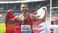 Bassem Hemeida celebrates after qualifying for the World Championships.
