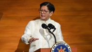 Philippine President Ferdinand Marcos delivers his speech during the State of the Nation Address at the House of Representatives in Manila on July 28, 2025. (Photo by Ted ALJIBE / AFP)
