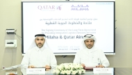 Qatar Airways Group and Milaha officials during the signing ceremony.