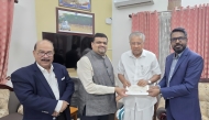 Shanavas Bava, President of ICBF; Thaha Muhammed, President of Indian Business and Professionals Council; and CV Rappai, Director of NORKA presenting the donation to Kerala Chief Minister H E Pinarayi Vijayan.