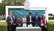Qatar Olympic Committee President H E Sheikh Joaan bin Hamad Al Thani, H E Sheikh Hamad bin Joaan Al Thani and Chairman of Qatar Tourism and Chair of the Board of Directors of Visit Qatar H E Saad bin Ali Al Kharji, trainer Francois Rohaut and jockey Christophe Soumillon pose on the podium.  
