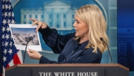 White House Press Secretary Karoline Leavitt displays a rendering for a new White House ballroom during the daily briefing in the Brady Briefing Room of the White House in Washington, DC, on July 31, 2025. Photo by Jim WATSON / AFP.
