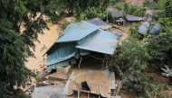 This photo taken by the Vietnam News Agency (VNA) on August 1, 2025 shows a collapsed house due to flooding in northern Vietnam's Dien Bien province. Photo by Trinh Xuan Tu / Vietnam News Agency / AFP