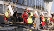 In this handout photograph taken on November 1, 2024 and released by the Ministry of Interior Affairs of Serbia and shows emergency and rescue teams working at the site where a concrete outdoor roof of a train station collapsed in the northern Serbian city of Novi Sad. Photo by MINISTRY OF INTERRIOR AFFAIRS OF SERBIA / AFP