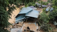 This photo taken by the Vietnam News Agency (VNA) on August 1, 2025 shows a collapsed house due to flooding in northern Vietnam's Dien Bien province. Photo by Trinh Xuan Tu / Vietnam News Agency / AFP