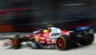 Ferrari' British driver Lewis Hamilton stops at the pits during the Formula One Hungarian Grand Prix at the Hungaroring circuit in Mogyorod near Budapest, Hungary, on August 3, 2025. (Photo by ANNA SZILAGYI / POOL / AFP)

