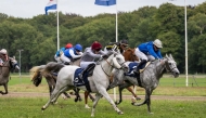 Al Shaqab Racing's Afjan (foreground) competes during the UAE President Cup at Duindigt.