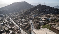 In this photograph taken on August 3, 2025, a general view shows the residential houses on a hillside in Afghanistan's capital, Kabul. (Photo by Wakil Kohsar / AFP)

