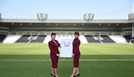 Qatar Airways staff with the new Al Sadd Sports Club jersey.