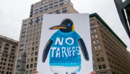 People protest President Donald Trump's tariffs in Manhattan on April 5, 2025. (Photo by John Taggart/For The Washington Post)
