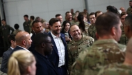 US Vice President JD Vance meets US troops during a visit to RAF Fairford, south west England on August 13, 2025. (Photo by HENRY NICHOLLS / AFP)