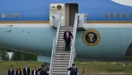 US President Donald Trump steps off of Air Force One upon arrival at Joint Base Elmendorf-Richardson in Anchorage, Alaska, on August 15, 2025.  (Photo by Andrew Caballero-Reynolds / AFP)
