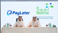 CEO of Damaan Islamic Insurance Company – Beema, Nasser Rashid Al Misnad (right) and Co-Founder and Managing Partner of PayLater Mohammed Al-Delaimi during the agreement signing ceremony.