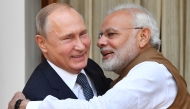 File: Indian Prime Minister Narendra Modi welcomes Russian President Vladimir Putin at Hyderabad House in New Delhi on October 5, 2018. (Photo by AFP)