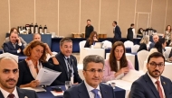 Acting President of QCAA, Mohamed Faleh Al Hajri, and other delegates at the event.