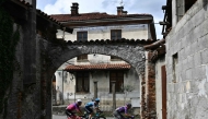 Riders cycle in a breakaway in Zubiena during the first stage of the Vuelta a Espana, a 183 km race between Torino - Reggia di Venaria and Novara, in Italy's Piemonte region, on August 23, 2025. (Photo by Marco BERTORELLO / AFP)