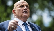 Rudy Giuliani speaks to reporters in Washington in July 2020. Photo credit: Jabin Botsford/The Washington Post