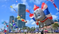 People take part in the Colombo International Kite Festival in Colombo on August 24, 2025. (Photo by Ishara S. KODIKARA / AFP)