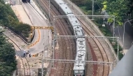 This frame grab made from AFPTV video footage taken on September 2, 2025 shows a train believed to be carrying leader Kim Jong Un approaching Beijing Railway Station in Beijing. (Photo by Agatha Cantrill / AFPTV / AFP)
